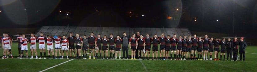 The Maddogs lined up on the field at night