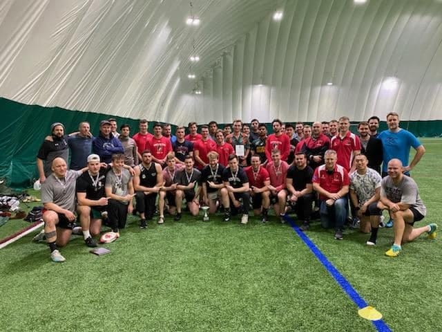 Alumni and players together in the Carter Field dome at the 2020 Memorial Touch Tournament