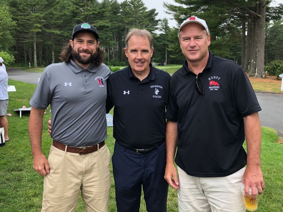 Alumni with NU athletic director Jim Madigan at the varsity golf tournament