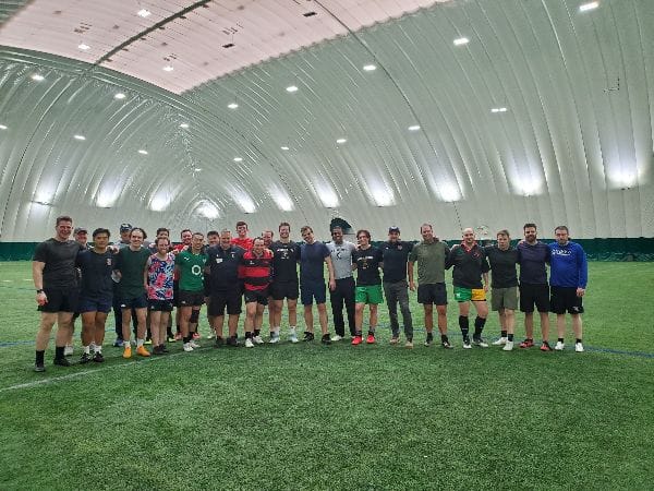 Alumni and undergraduates in the Carter Field dome for the 40th anniversary alumni match